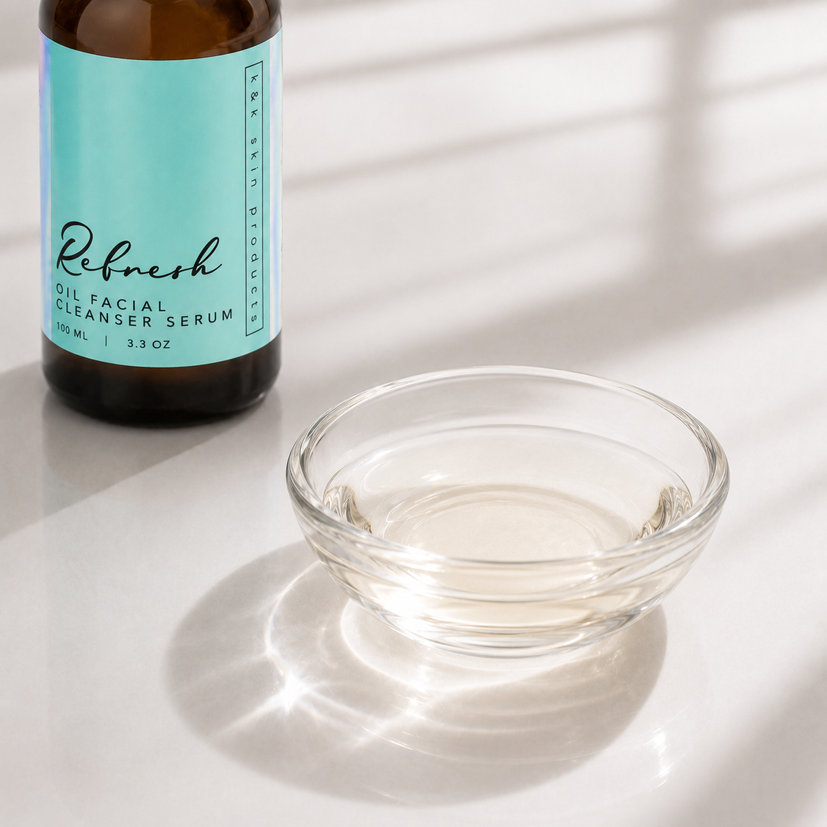 Refresh Oil Facial Cleanser Serum oil texture in a glass bowl