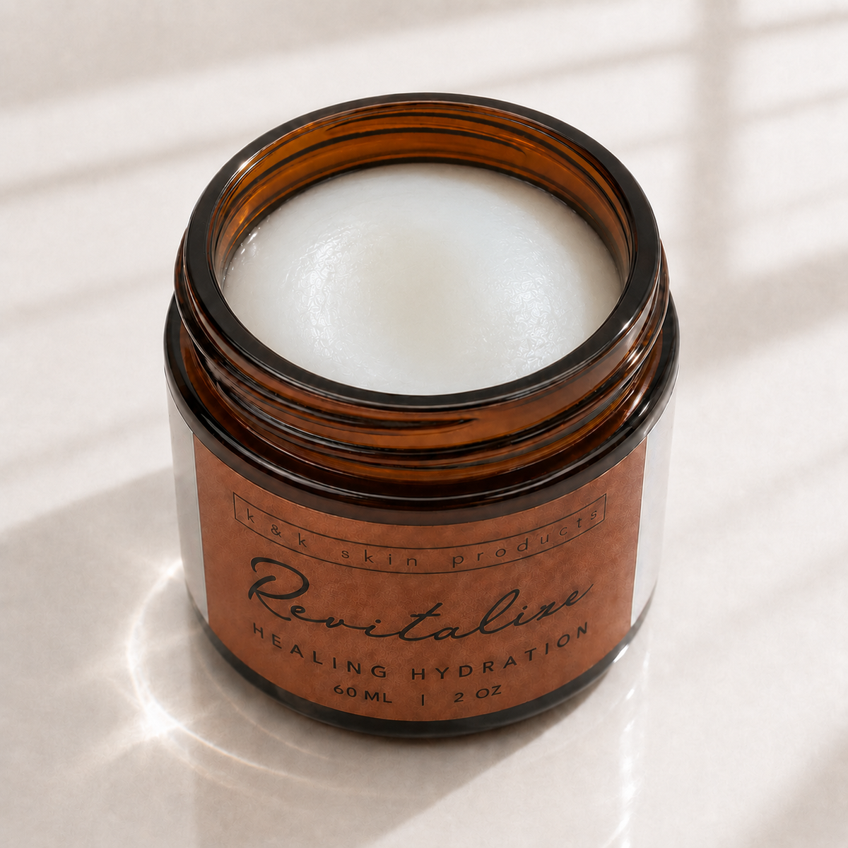 Revitalize Healing Hydration moisturizer texture in a glass bowl