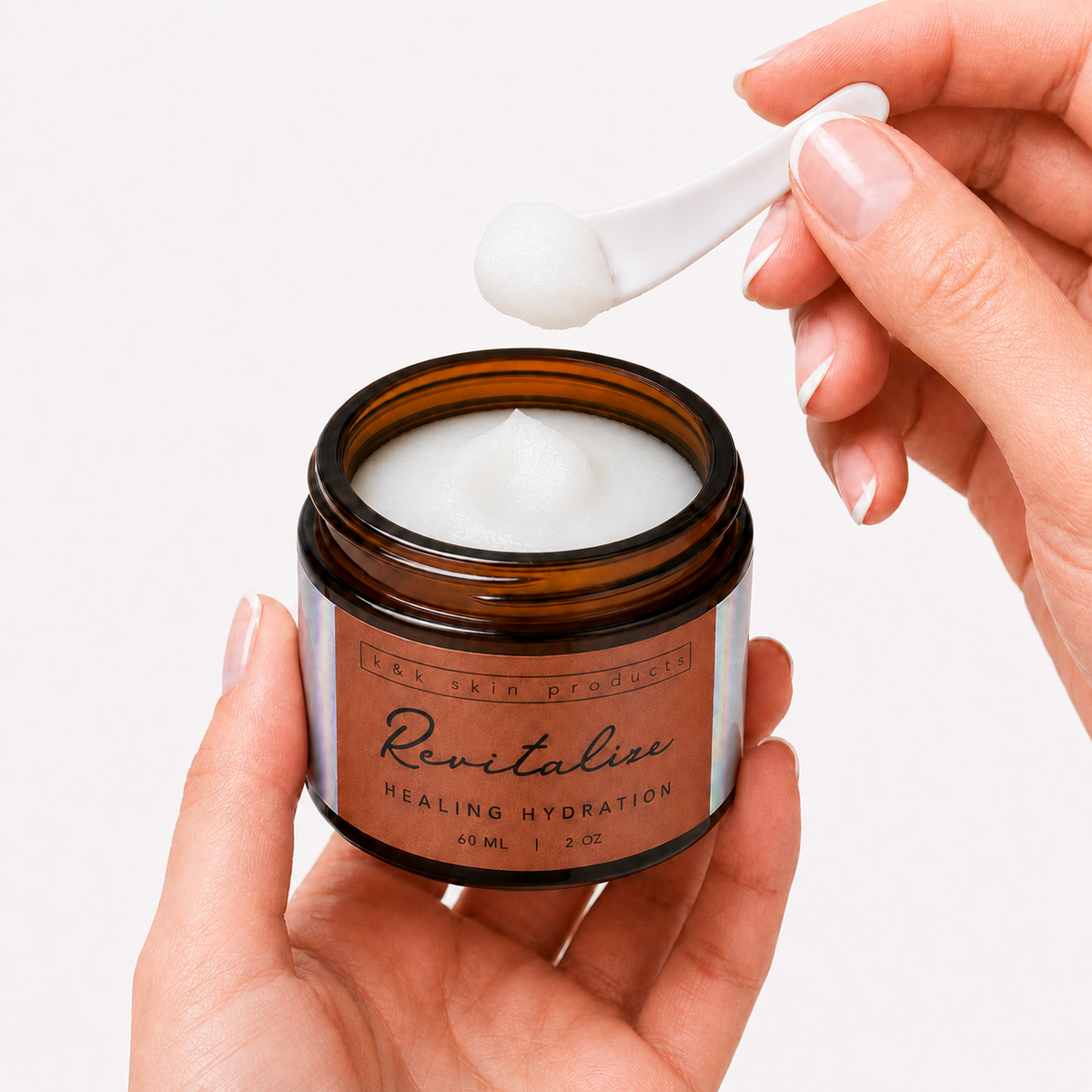 Revitalize Healing Hydration being applied to skin