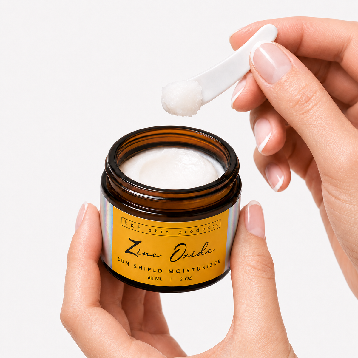 Zinc Oxide Sun Shield Moisturizer being applied to skin