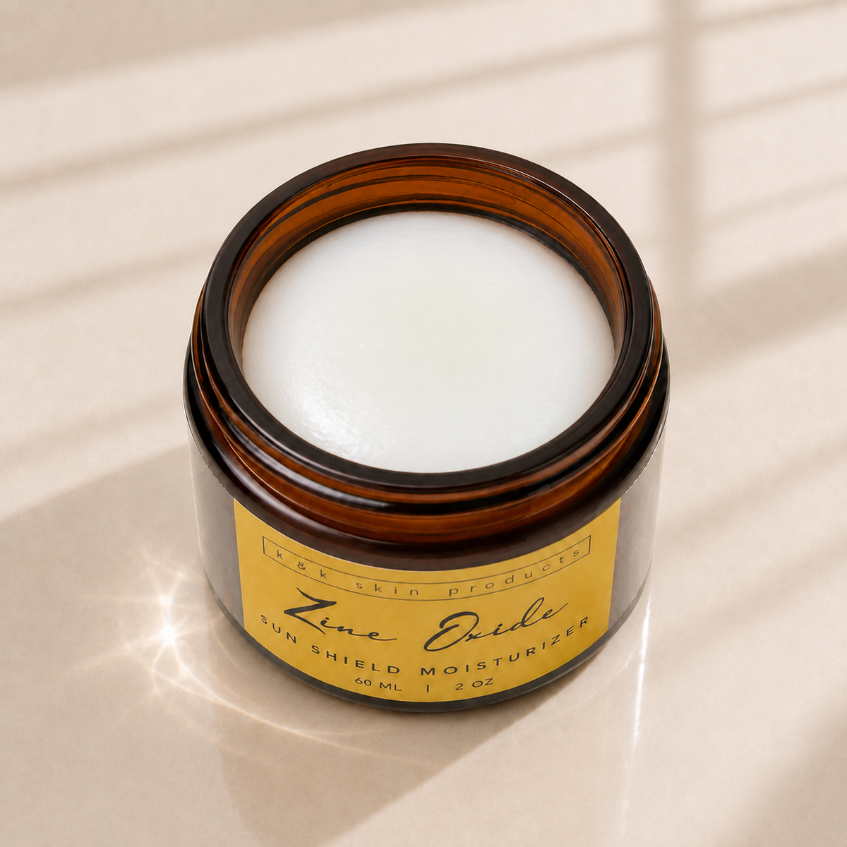 Zinc Oxide Sun Shield Moisturizer texture in a glass bowl